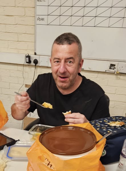 MICHAEL SHARES HIS COOKING SKILLS WITH HIS TEAM