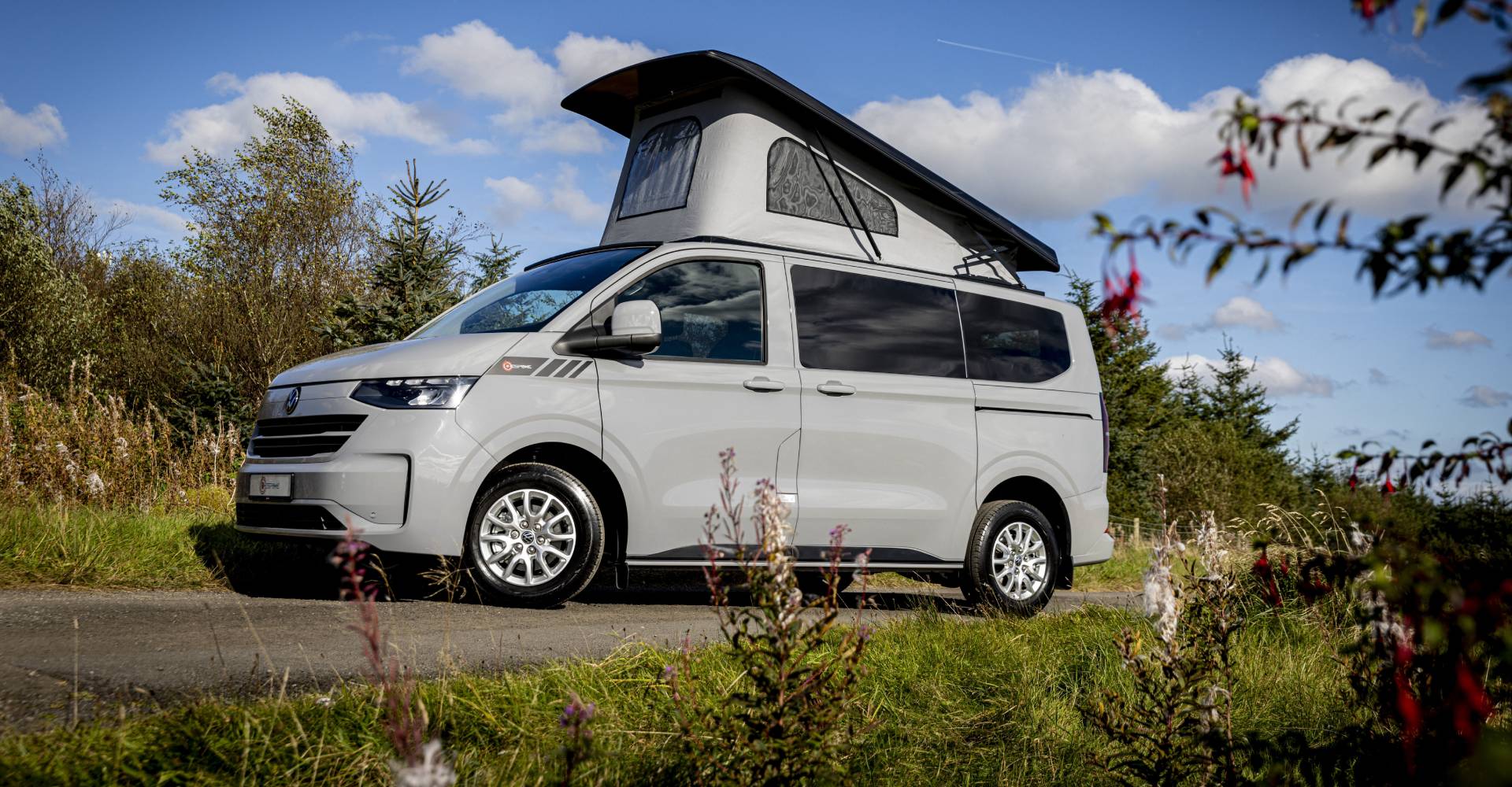Tmc Bespoke Transporter Exterior Among Plants - Tottington Motor Company