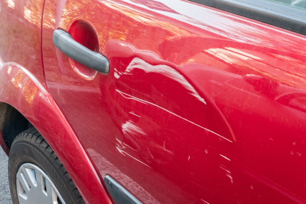 Scratches On The Side Door Of The Red Car Collisi 2023 11 27 05 33 59 Utc Scaled - Premier Sports Solutions