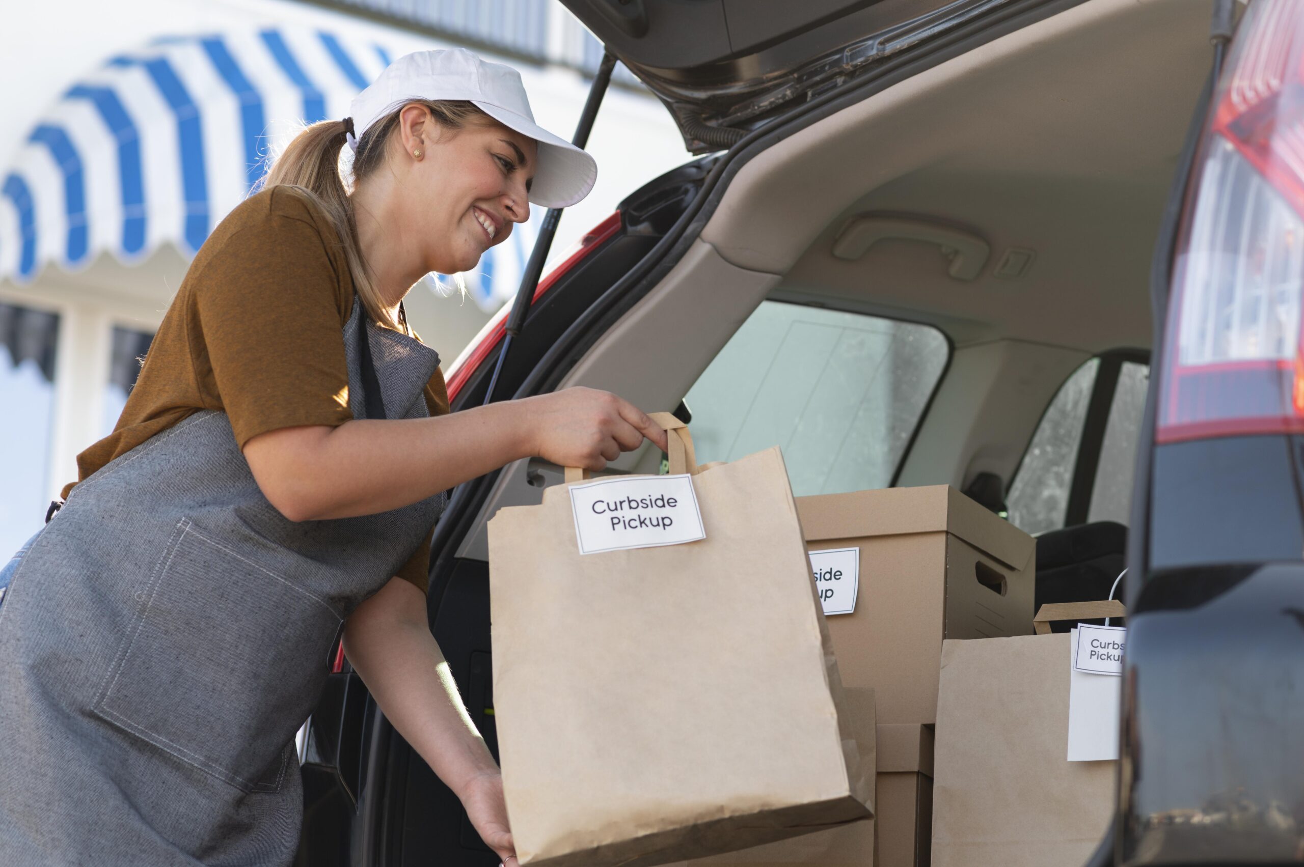 Woman Giving Order Curbside Pickup - Exeter Diesels
