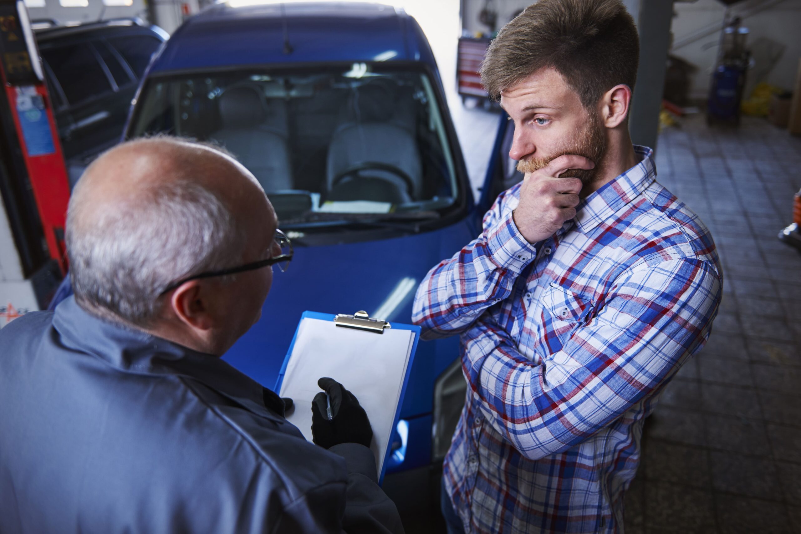 Customer Talking With Mechanic Workshop (1) - Exeter Diesels